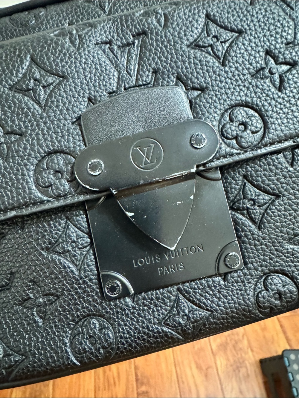 Louis Vuitton Black Monogram Embossed Messenger Bag - Picture 2 of 9